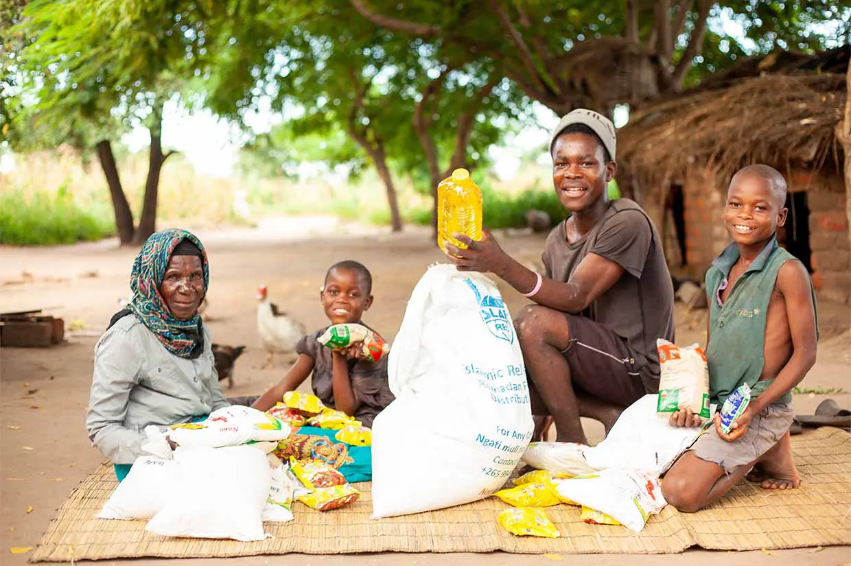 Hands holding grain, representing food security and hunger relief by Islamic Relief
